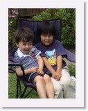 Dsc00865 * Rasi and cousin Nicko sharing a chair * 864 x 1152 * (212KB)